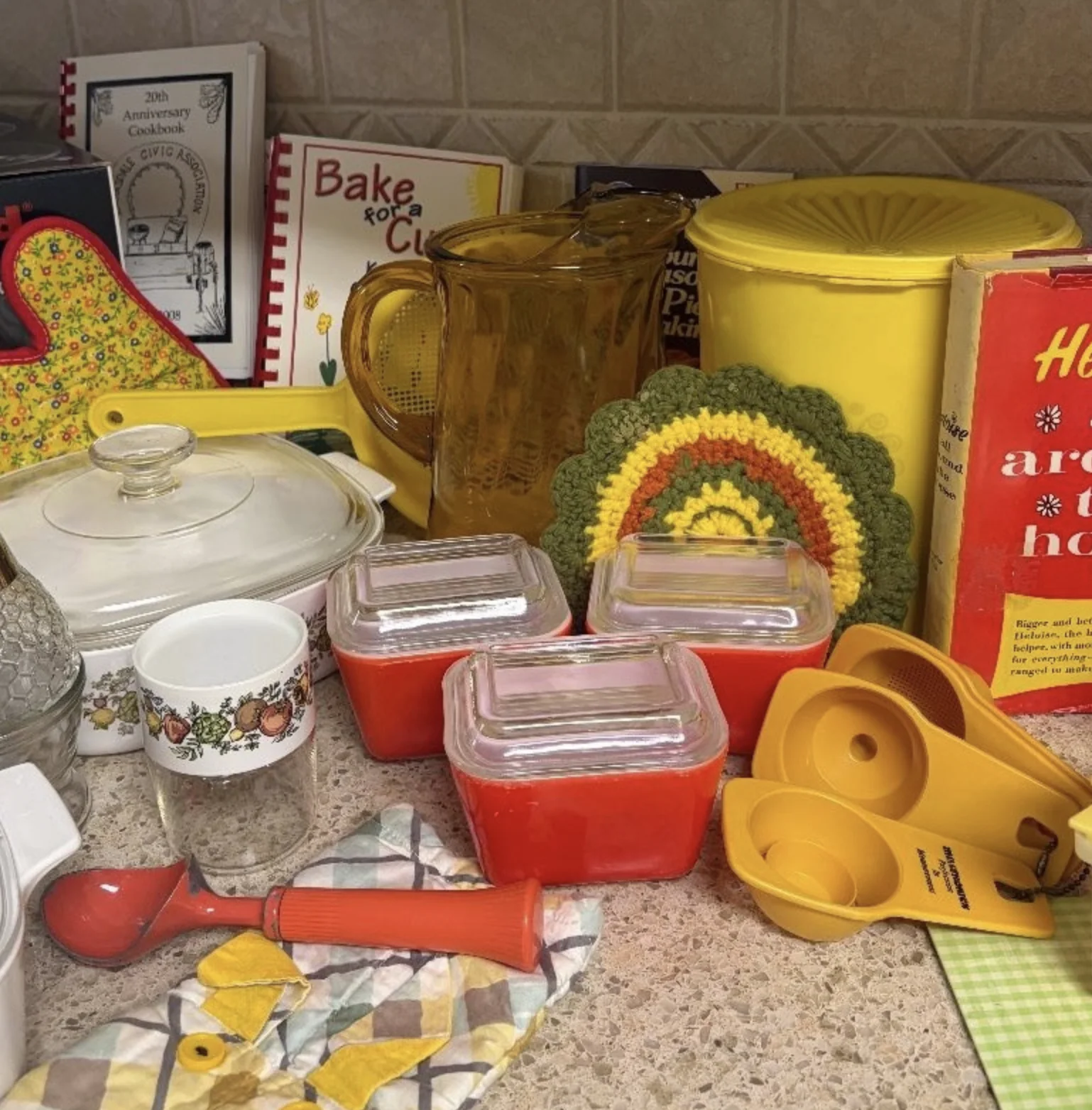 Red and yellow vintage kitchenware from a Cypress estate sale