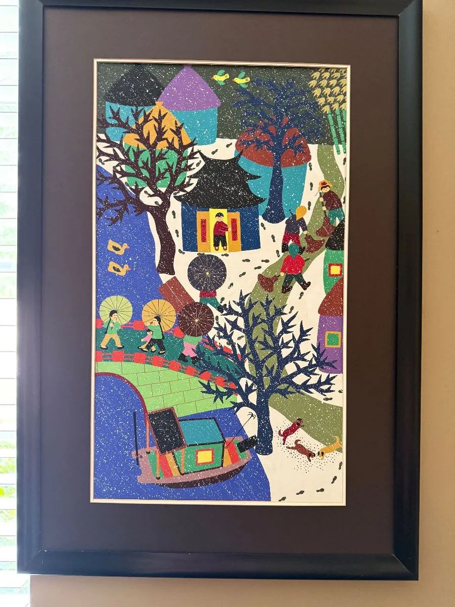 Colorful framed folk art discovered in a past estate collection