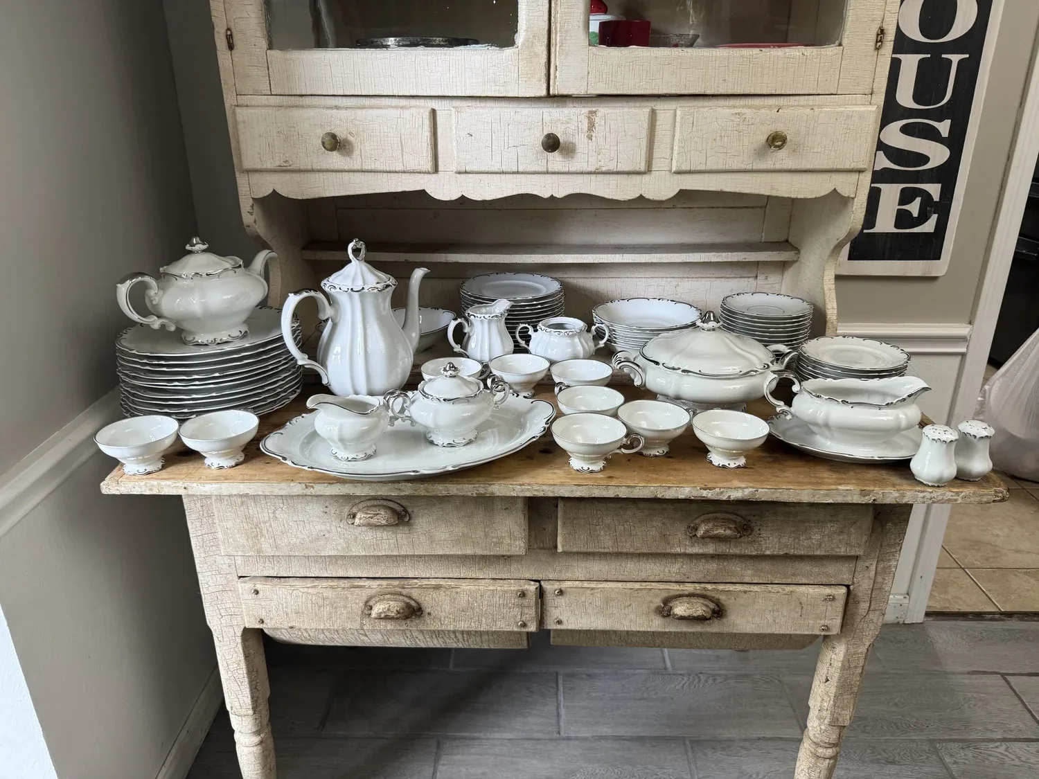 Porcelain arranged for an estate sale