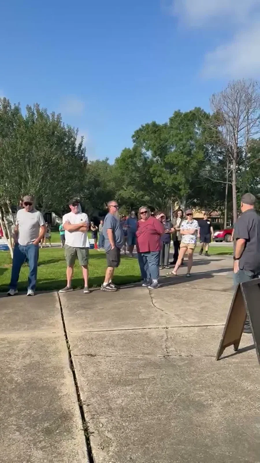 Shoppers lined up outside a J and M estate sale