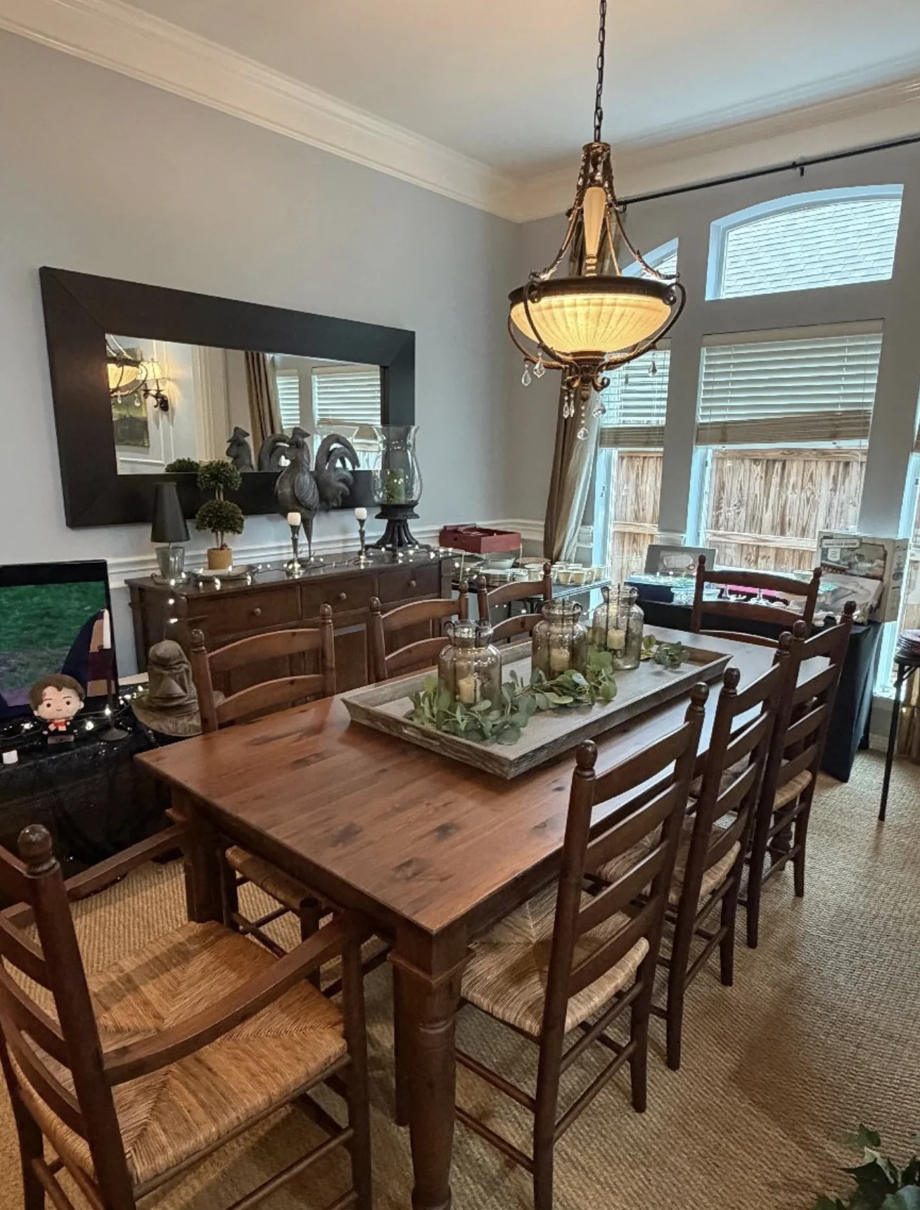 A dining room arranged for an in-home J and M estate sale